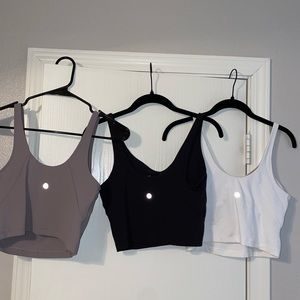 - LULULEMON ALIGN TANKS SIZE 6; black, white, violet